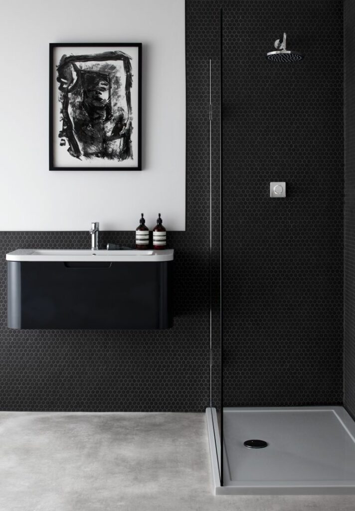 Black bathroom with a splash panel new to this decade